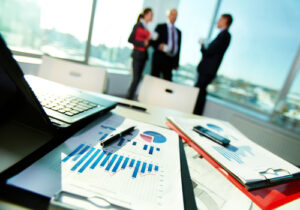 Business people conferring in office, accountancy errors concept