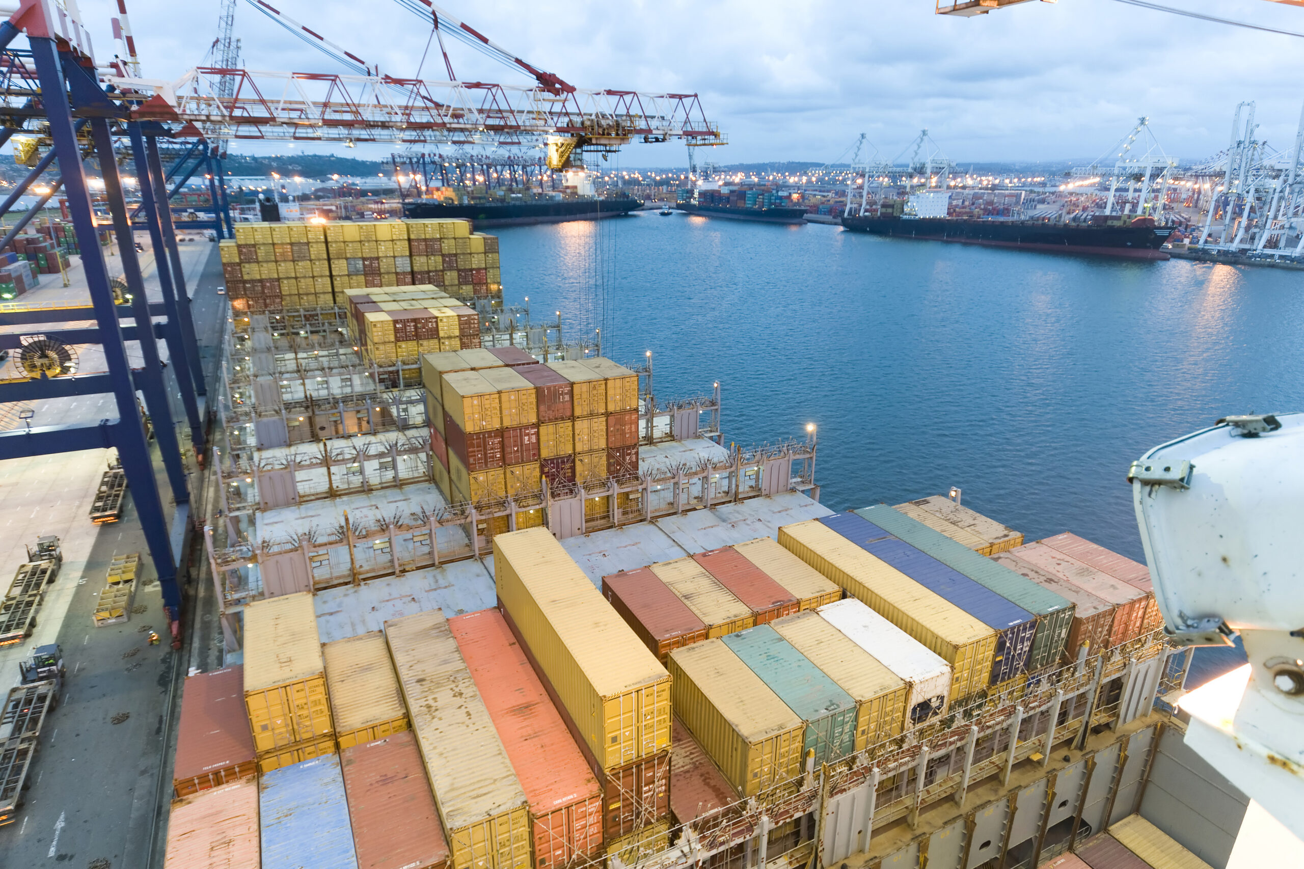 freight containers in a shipyard, import licence concept