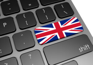 Laptop keyboard with Union Jack on return button, .uk concept