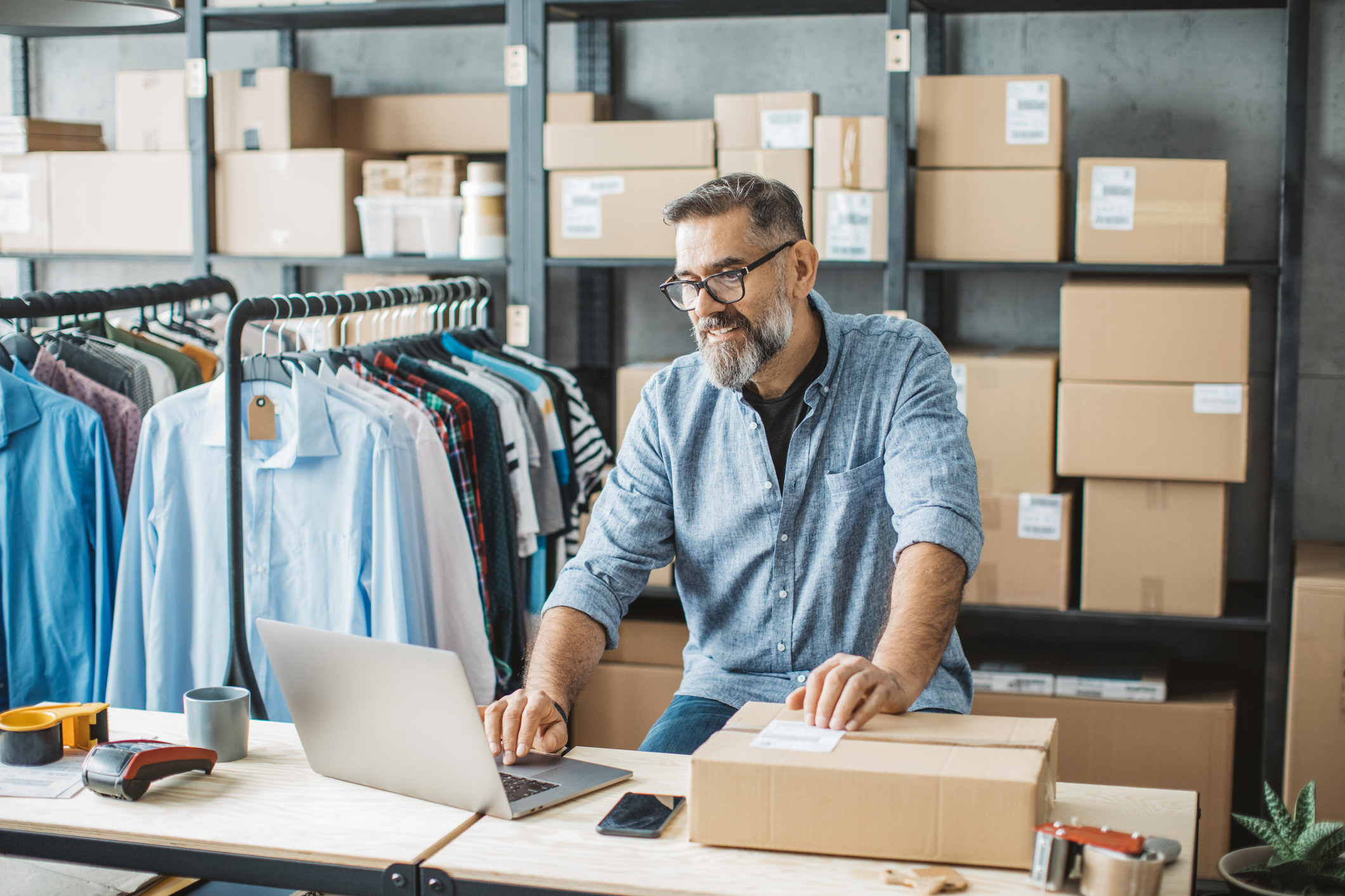 Man running an online clothing business