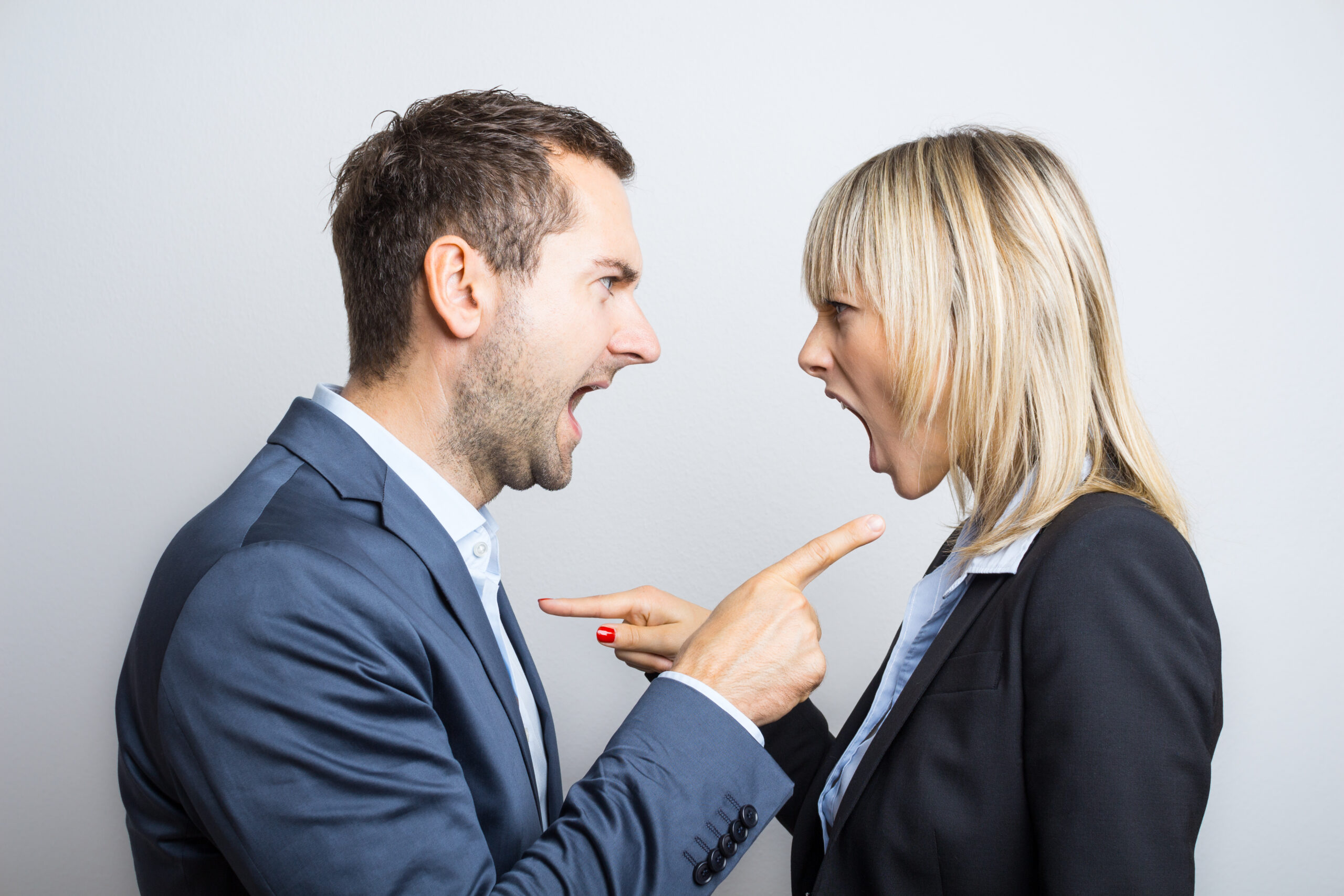 Business couple arguing