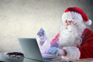 Father Christmas at laptop, Christmas SEO concept