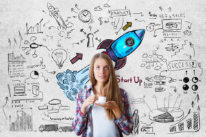 Young European woman drinking coffee on concrete background with colorful launching rocket sketch. Registering a company name concept