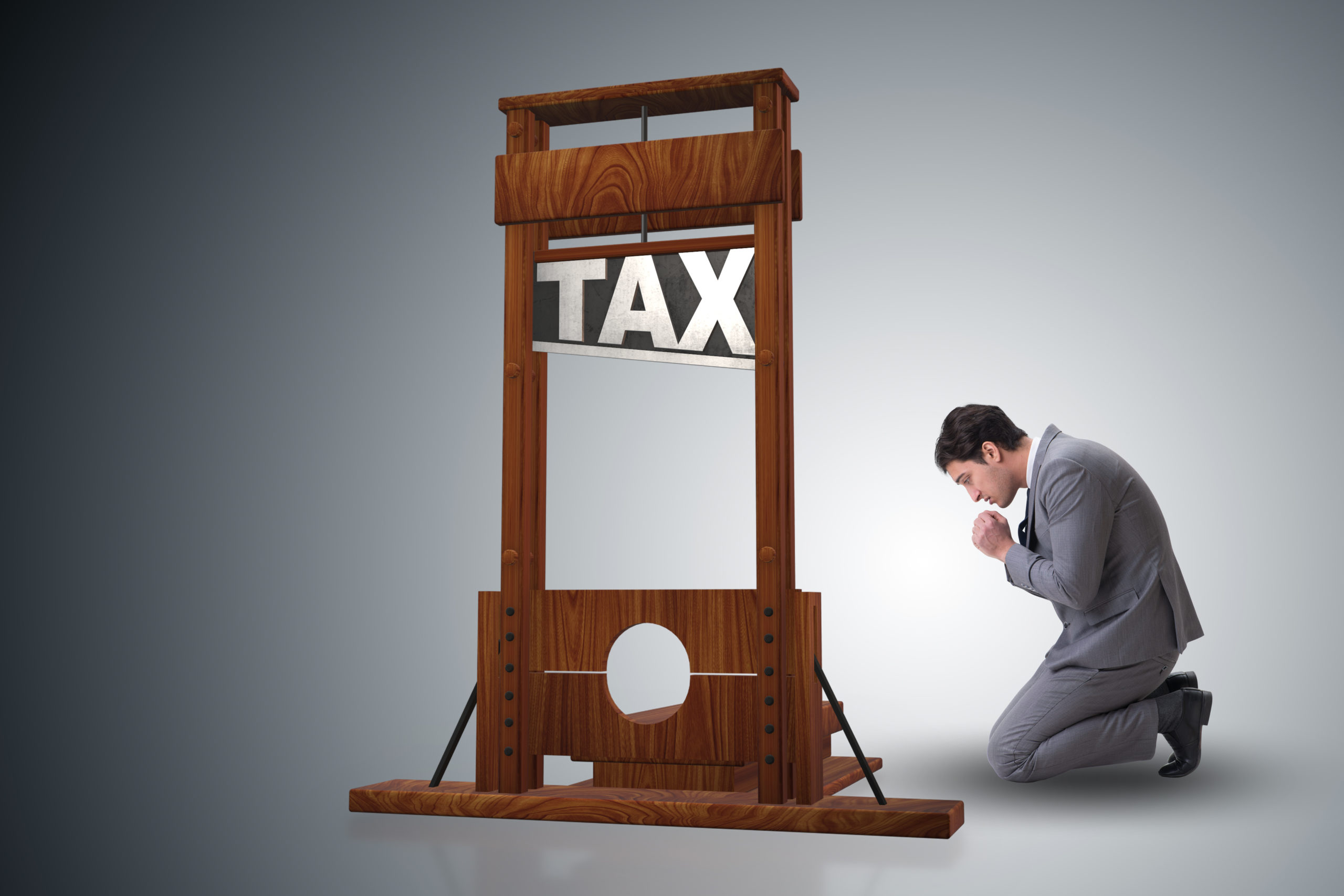 Businessman praying by side of guillotine, Sajid Javid Entrepreneurs' Relief concept