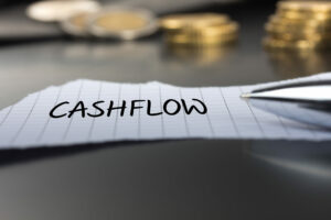 cashflow written on piece of paper, cashflow concept