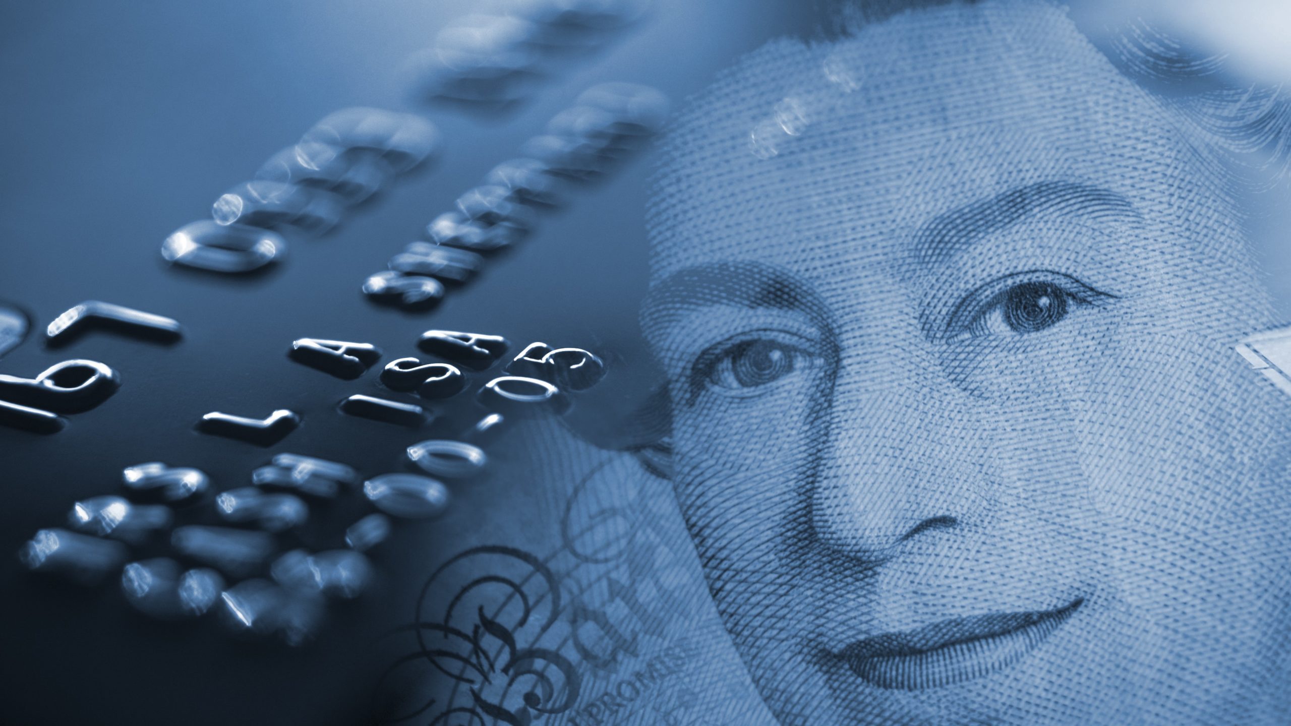 Queen's portrait alongside credit card, coronavirus small business grant concept