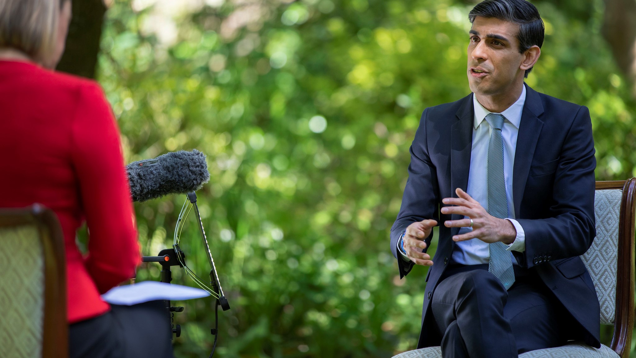 Rishi Sunak being interviewed by BBC political editor Laura Kuenssberg, furlough scheme small business concept