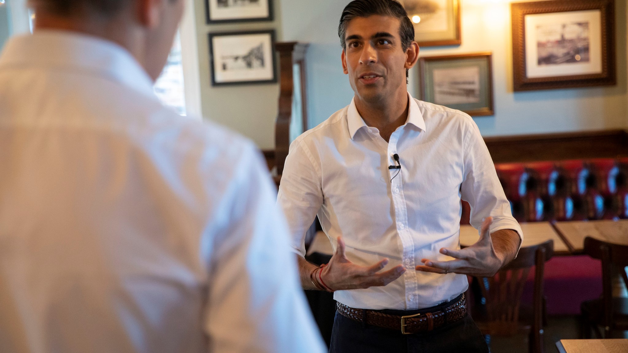 Chancellor Rishi Sunak visits pub ahead of reopening post lockdown, £1000 grants concept