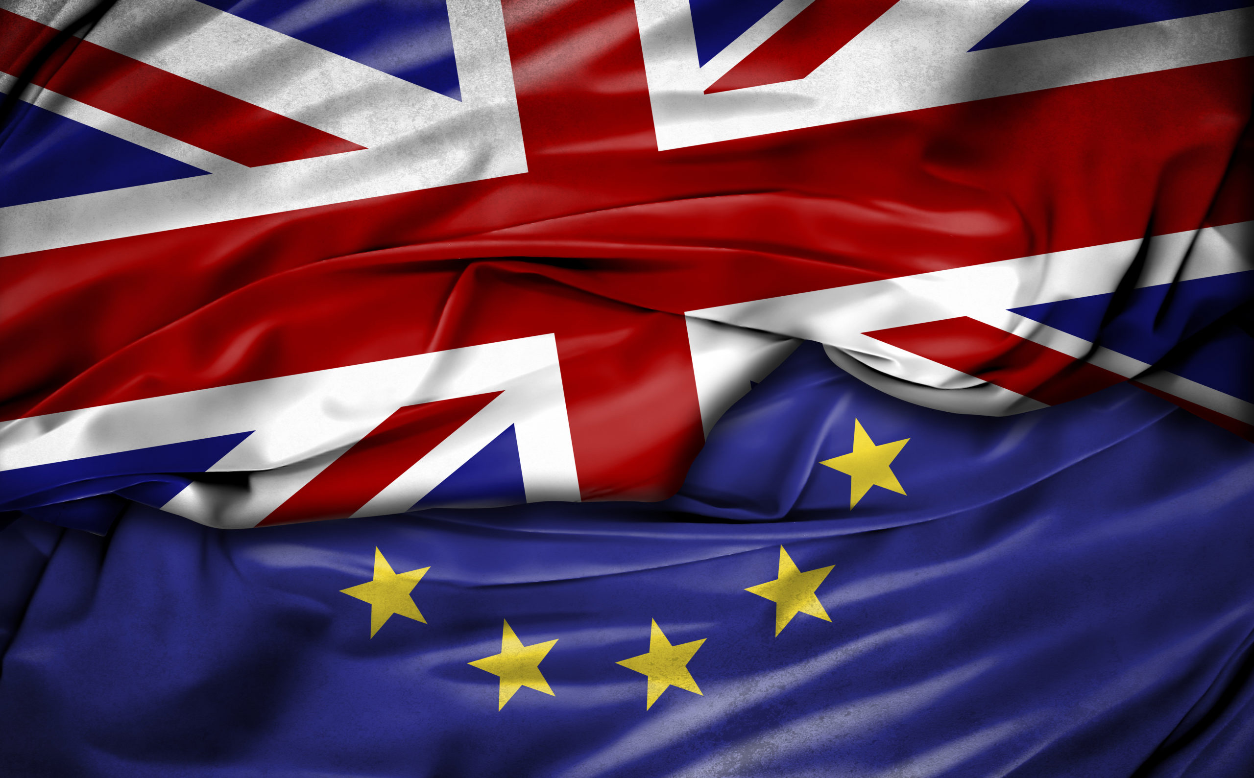 Union Jack and EU flags, Brexit Support Grant concept