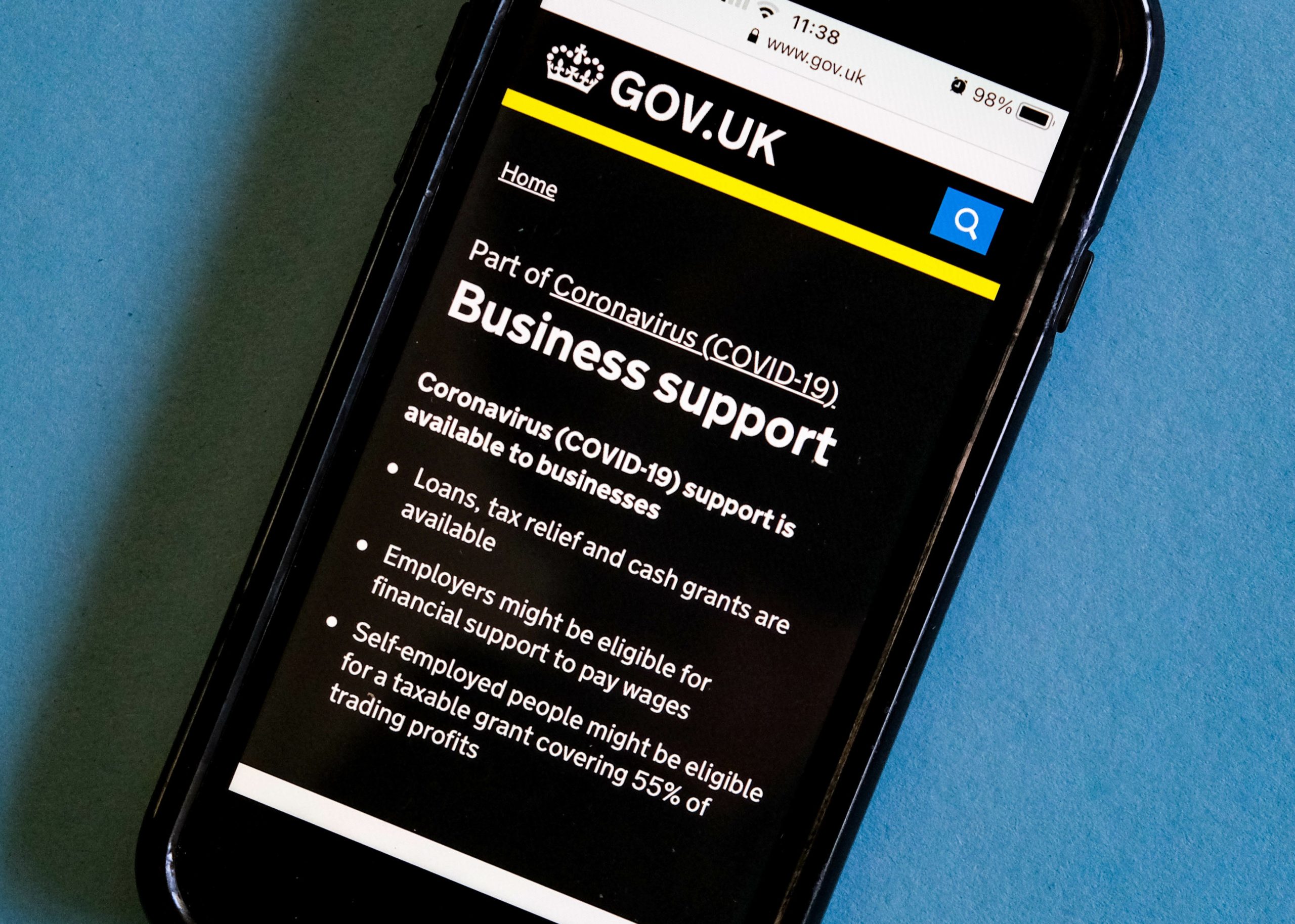 Smartphone with government business support home screen, banks Bounce Back Loans concept