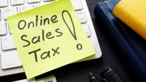 Online Sales Tax written on Post-It note