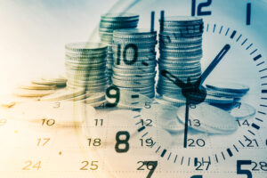 Piles of coins with clock superimposed, apply for finance concept