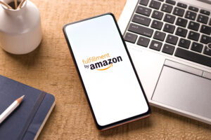 Fulfillment by Amazon logo on smartphone