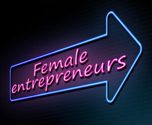 New companies women concept. Illuminated neon arrow with words Female Entrepreneurs written in pink.