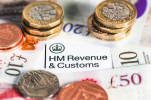 HMRC letter and British pounds and pence. Tax gap concept