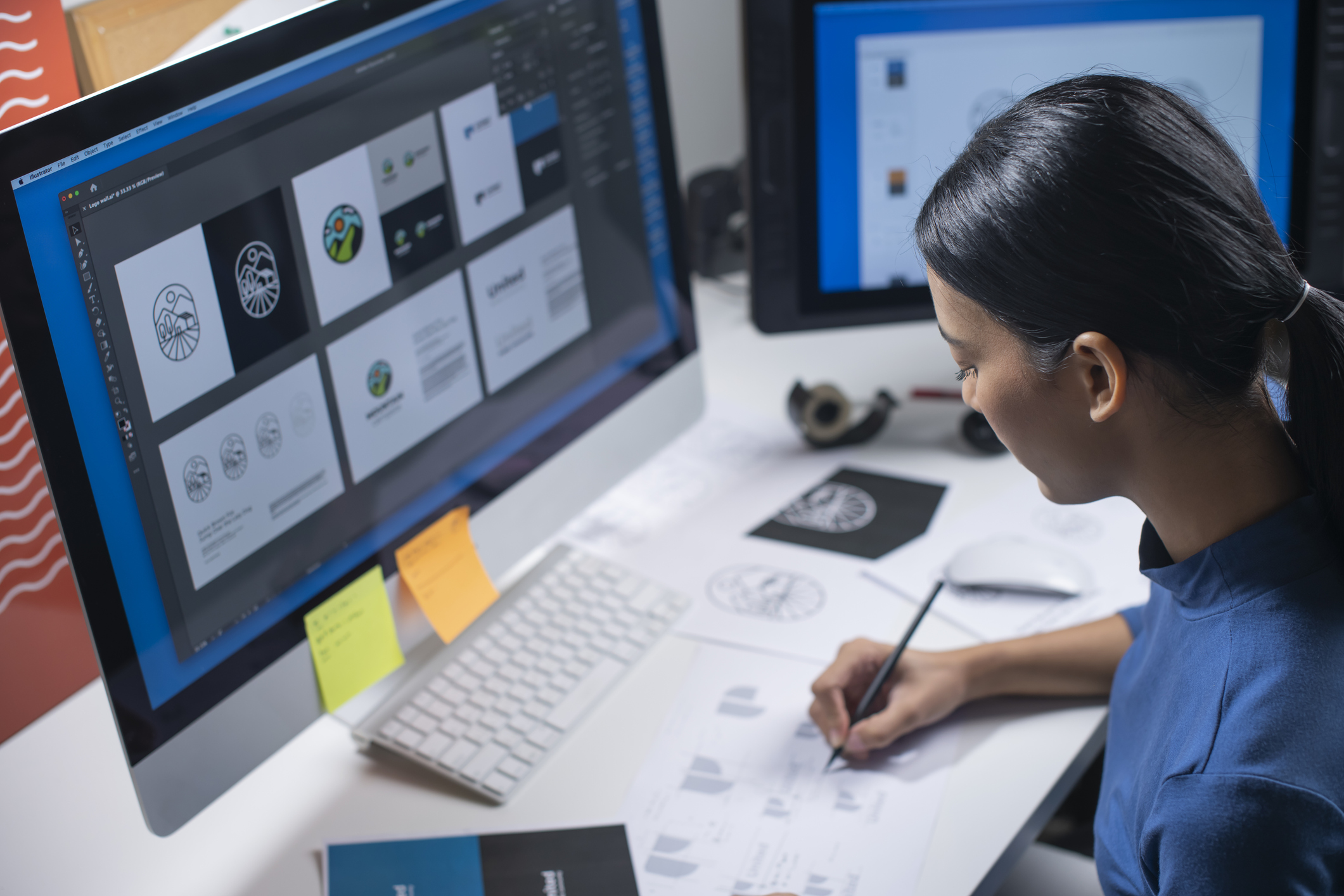 Graphic designer working on logos